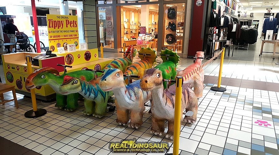 dinosaur electric car in shopping mall